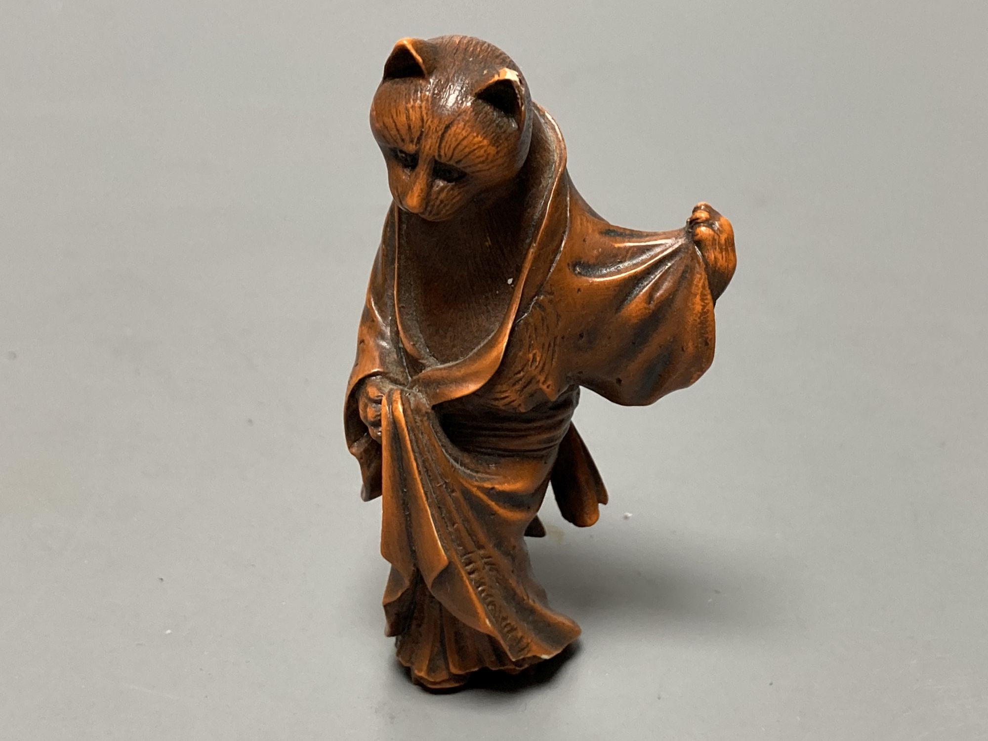 A quantity of assorted Japanese carvings, netsuke, etc.